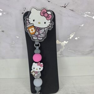 Hello Kitty Pink and Gray Beaded Badge Reel